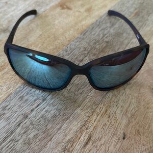 Oakley Sunglasses with Blue Lenses and Black Frame. NWOT.